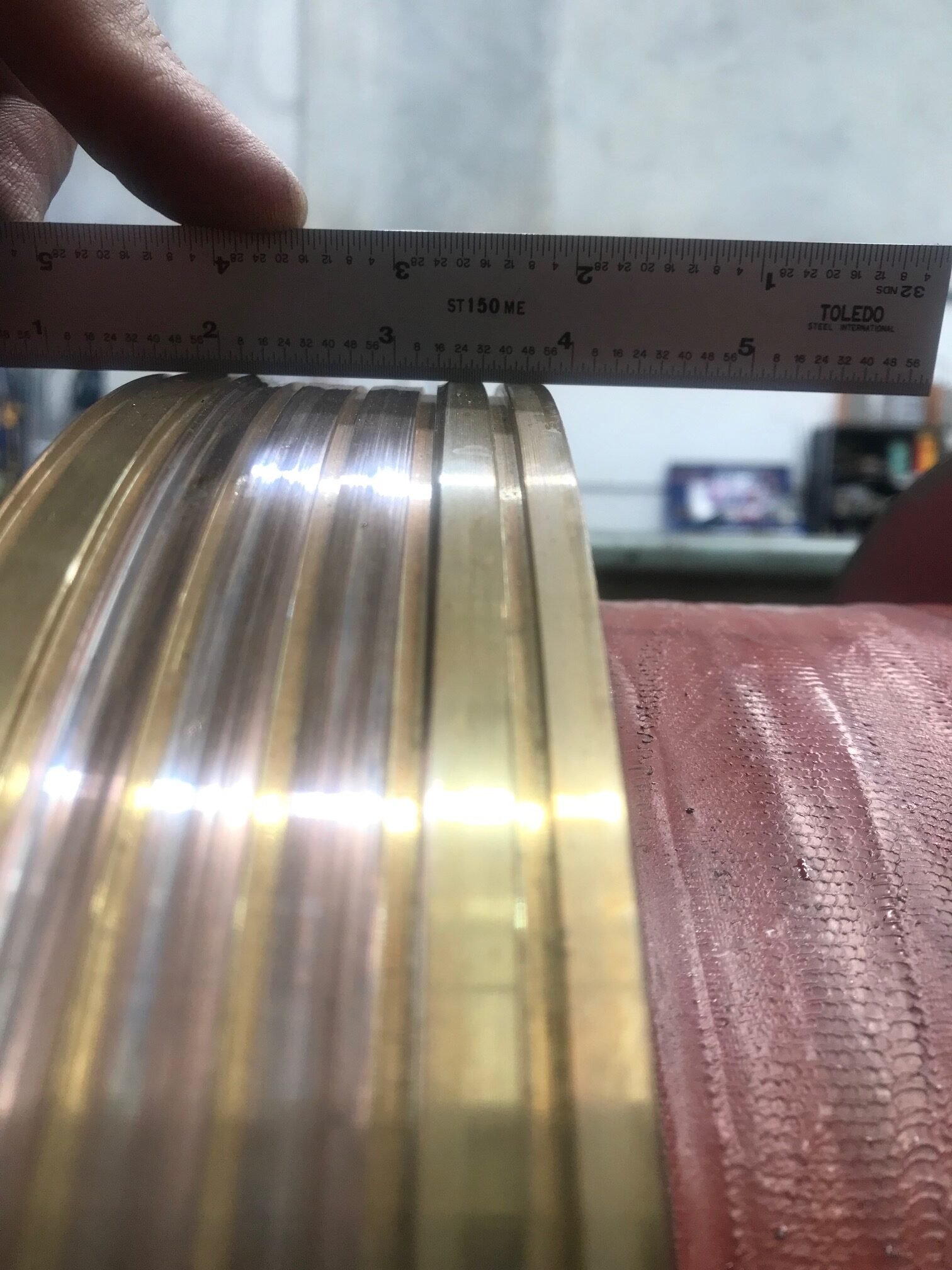 Measuring machined component dimensions