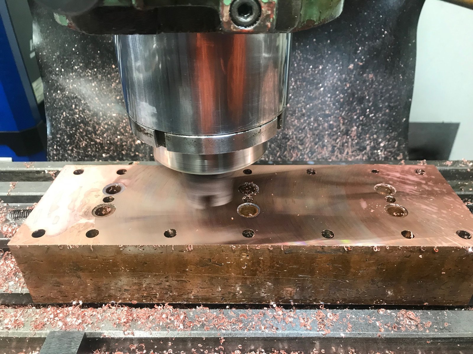Milling and machining metal component plate